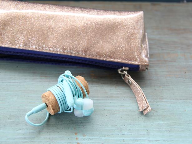 earbuds wrapped around wine cork earbuds wrapped around wine cork