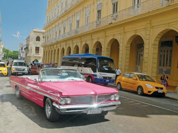 A pink 1962 Pontiac convertible A pink 1962 Pontiac convertible