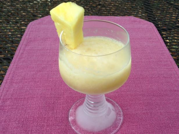 A frozen Pina Colada cocktail A frozen Pina Colada cocktail
