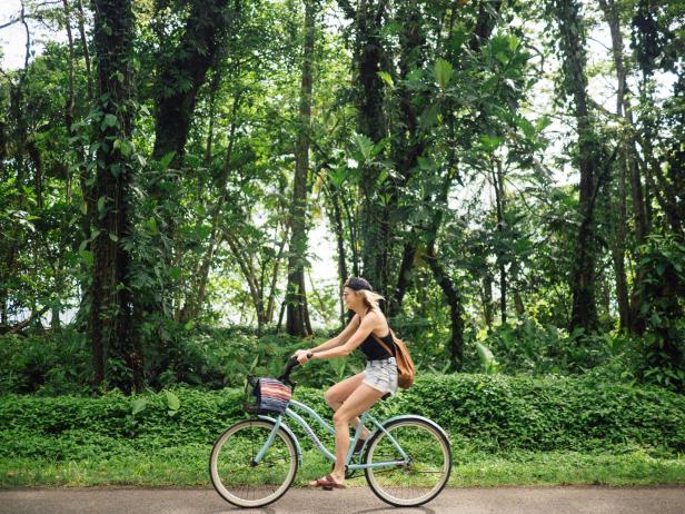 Girl riding bike on vacation in Costa Rica Girl riding bike on vacation in Costa Rica
