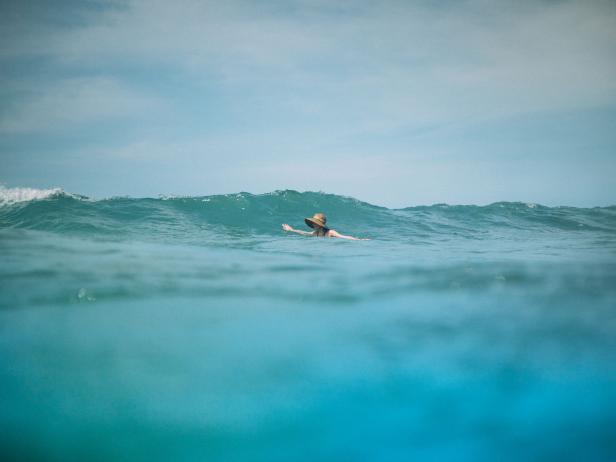 Woman swimming in ocean Woman swimming in ocean