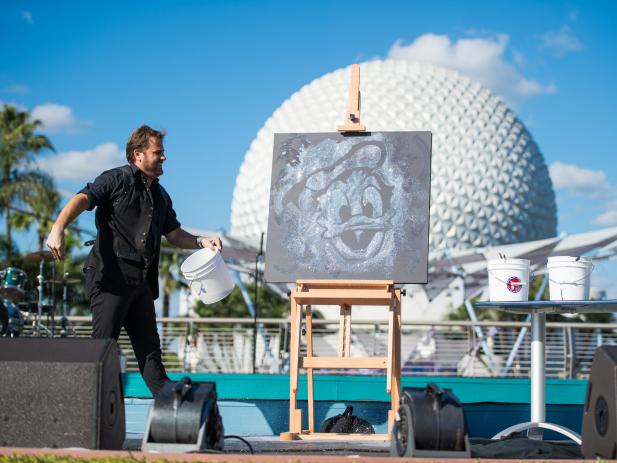 Man Demonstrating Chalk Art of Donald Duck