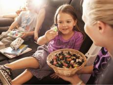 Little Girl Grabbing Candy From Flight Attendant