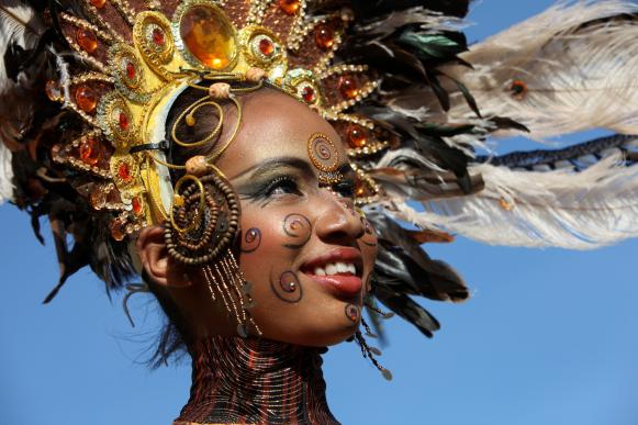 A reveller participates in the Red Cross Children's Carnival competition at the Queen's Park Savannah in Port of Spain, February 6, 2010. REUTERS/Andres De Silva (TRINIDAD AND TOBAGO - Tags: SOCIETY)