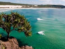 Perched on the sunny Queensland coast 161 miles northeast of Brisbane, Fraser Island is the world's largest sand island and home to one of the world's best beaches.