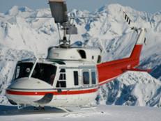 Super-advanced ski and board hounds taking advantage of the planet's most extreme winter-sports experience: Heli-skiing in Alaska.