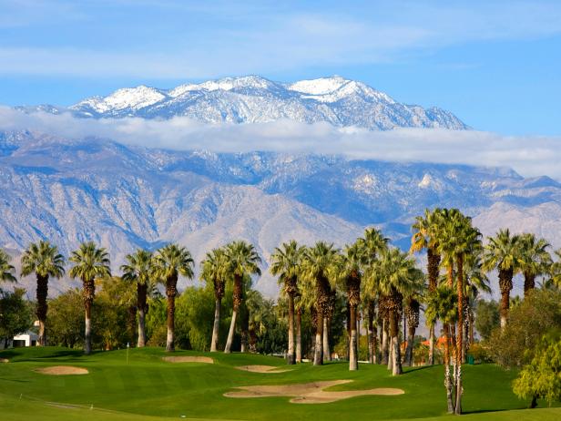 Golf Course by Palms and Mountains
