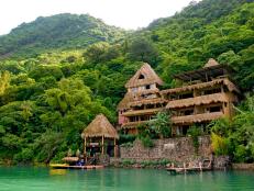 Laguna Lodge Eco Resort and Nature Reserve is set on Guatemala's stunning Lake Atitlan. Enter this modern Mayan world by boat and stay in suites inspired by nature and created from volcanic stone, adobe and palm.