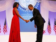 President Barack Obama bows to First Lady Michelle Obama at the <a href=_.html>Inaugural</a> ball in Washington, DC on Jan. 21, 2013.