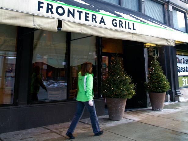 woman walking outside of the frontera grill