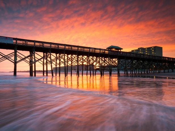 Folly beach has a long and sorted history. Known originally as "Coffin Island," Folly Beach was where incoming ships would leave the ill and disease-stricken before entering the city of Charleston. Upon leaving again, they would bury those that did not make it on the west end of the island where the county park now sits. According to internet materials, the first shot of the Civil War was fired on Morris Island in the 1860s and for much of its history Folly Island has been viewed as relatively lawless; a place where bootleggers and those hiding from the law sought refuge. However, in the 1960s Folly was apparently cleaned up and amenitized with 1700+ feet of pier, boardwalk, amusement rides and the such. This was known as Folly's "golden age." However, the pier was burned in 1977 (suspected arson) and Hurricane Hugo cleaned up in 1989. The current pier shown in the picture was built in 1995.