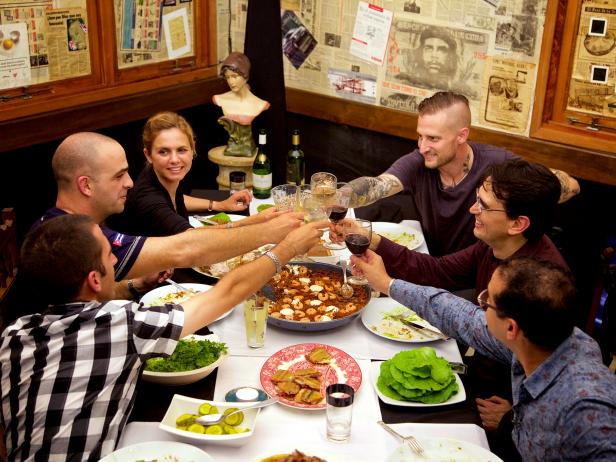 Mariana Van Zeller and Michael Voltaggio at dinner in Cuba as seen in Breaking Borders Mariana Van Zeller and Michael Voltaggio at dinner in Cuba as seen in Breaking Borders