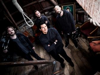 Zak, Aaron, Billy, and Jay pose together in the attic of the Manresa Castle.