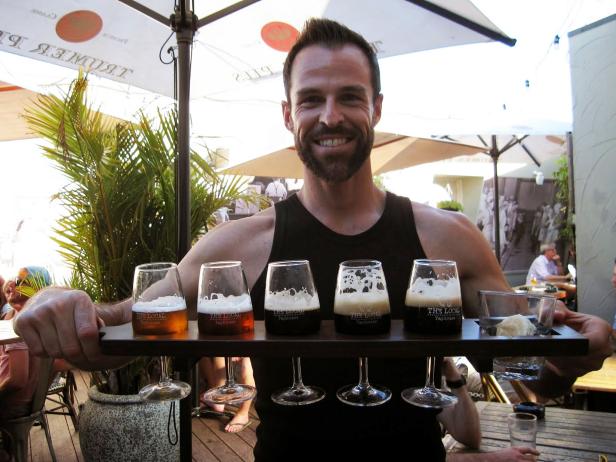 Ewan Porter Holds Beer Tray Ewan Porter Holds Beer Tray