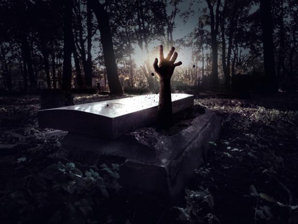 Hand rising out from the grave Hand rising out from the grave