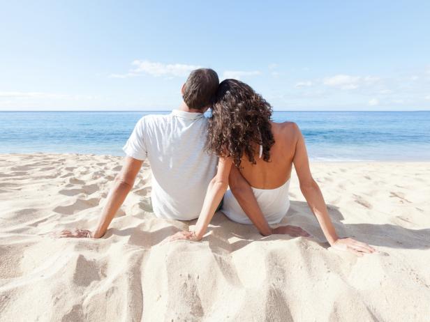 Couple sitting on the beach Couple sitting on the beach