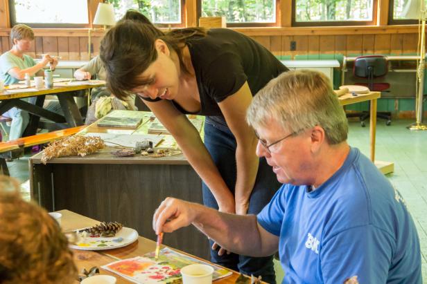 Cincinnati-based mixed media artist Katie St. Clair teaches a class at the Porcupine Mountains Folk School. 