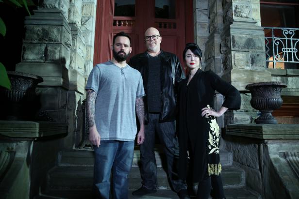 3 Quarters hero shot of Shane Pittman (left), Dave Schrader (center), and Cindy Kaza (right) in front of Franklin Castle in Cleveland OH, as seen on Travel Channel's The Holzer Files.