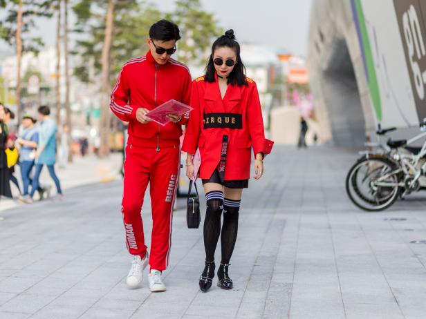 SEOUL, SOUTH KOREA - OCTOBER 20: Guests wearing a red Adidas tracksuit and stockings on October 20, 2016 in Seoul, South Korea. (Photo by Christian Vierig/Getty Images)