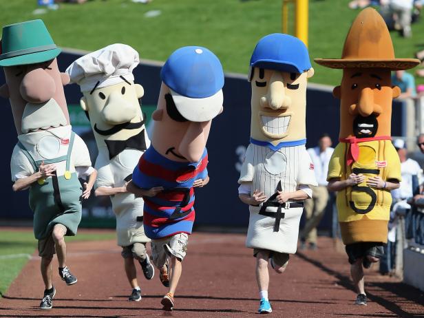 PHOENIX, AZ - MARCH 07:  The Sausage Race mascots compete during the spring training game between the San Diego Padres and Milwaukee Brewers at Maryvale Baseball Park on March 7, 2014 in Phoenix, Arizona.  (Photo by Christian Petersen/Getty Images)