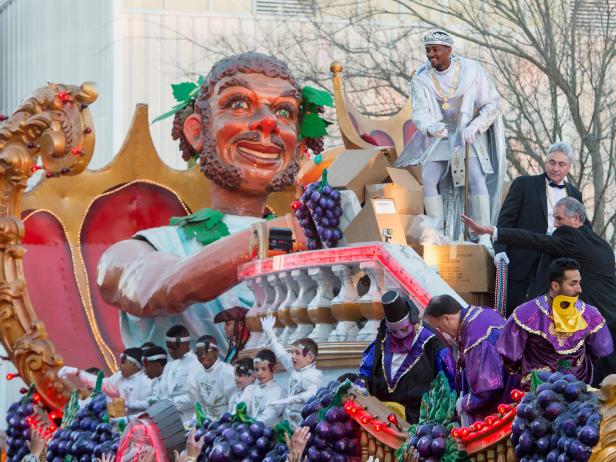 NEW ORLEANS, LA - FEBRUARY 07:  Actor and native New Orleanian Anthony Mackie tosses Mardi Gras beads to fans as he reigns as King of Bacchus  XLVIII in the 2016  Krewe Of Bacchus parade on February 7, 2016 in New Orleans, Louisiana. Mackie is the first African-American monarch for the krewe.  (Photo by Erika Goldring/Getty Images)