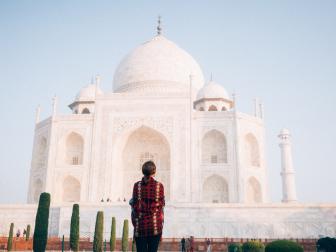 Woman looking at Taj Mahal 