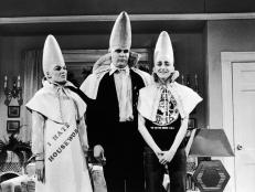 Circa 1975, Jane Curtin, left, Dan Aykroyd and Laraine Newman, in a still from their skit 'The Coneheads' on the television comedy show Saturday Night Live, 1970s. (Photo by Warner Bros./Getty Images)