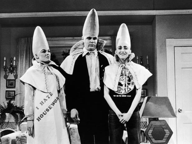 Circa 1975, Jane Curtin, left, Dan Aykroyd and Laraine Newman, in a still from their skit 'The Coneheads' on the television comedy show Saturday Night Live, 1970s. (Photo by Warner Bros./Getty Images)