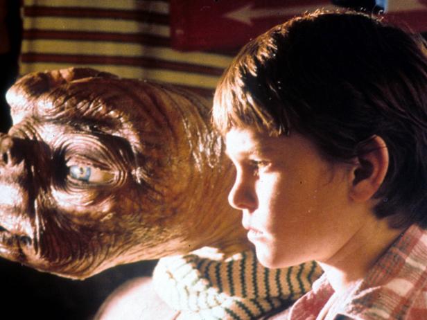 ET looking out window with Henry Thomas in a scene from the film 'E.T. The Extra-Terrestrial', 1982. (Photo by Universal/Getty Images)