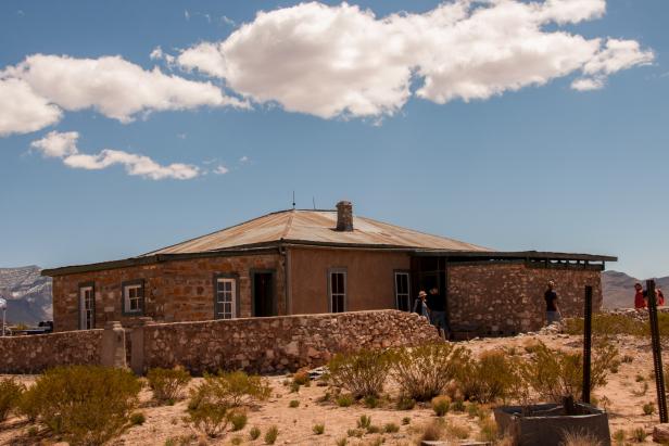 Socorro, New Mexico, USA  - April 2, 2016: Scientists used this ranchhouse to assemble the world's first atomic bomb that was detonated in a remote area of south central New Mexico. The technology for a nuclear weapon was developed in extreme secrecy in what was known as the Manhattan Project. The test bomb, which was exploded July 16, 1945, proved that the concept would work and led to the dropping of two powerful atomic bombs on Japan -- helping to end World War II. Open houses are conducted free for the general public twice yearly at what is now known as the Trinity Site (ground zero), where photographs of various exhibits are permitted. The Trinity Site located about  35 miles southeast of of Socorro, New Mexico is a National Historic Landmark. 