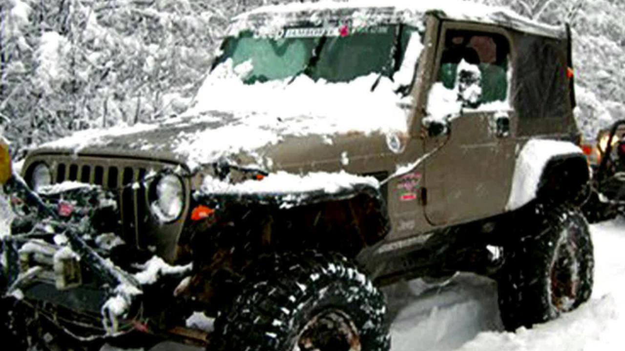 Jeep Stranded in Deep Snow