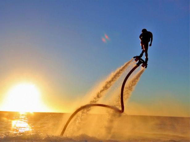 Man flyboarding in the air