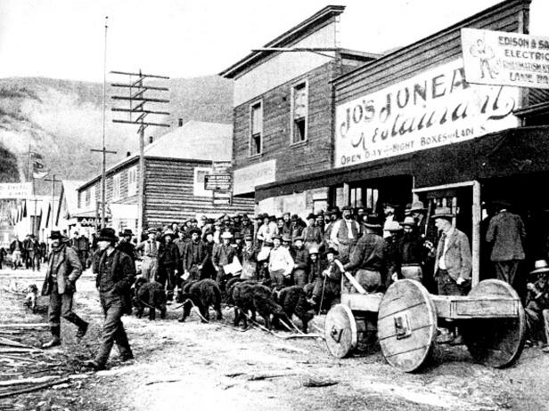 The Klondike Gold Rush: Summer car in a street of Dawson, 1899, United States. (Photo by: Photo12/UIG via Getty Images)