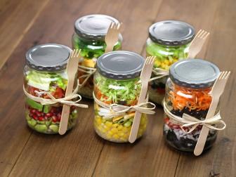 salad in glass mason jars