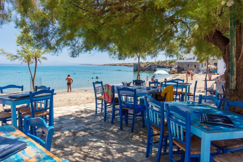 Tables of beach restaurant in Moutsouna, Naxos Island, Greece
