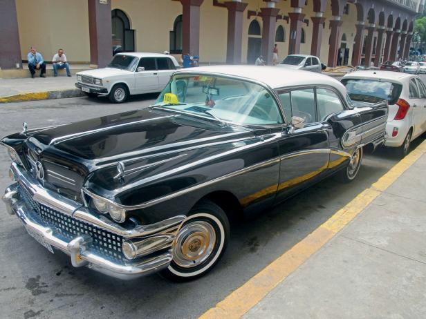 Black Chevy Taxi with white top in Havana, Cuba