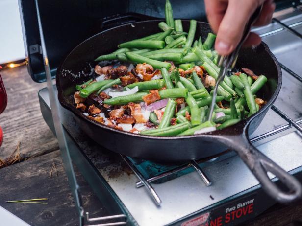 Green beans cooking in skillet.