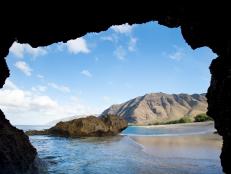 view of Makua Beach from inside cave in the Ka'ena Point State Park, Hawaii as seen on Travel Channel's Top Secret Beaches episode TTSB102H.