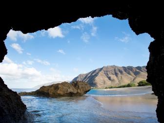 view of Makua Beach from inside cave in the Ka'ena Point State Park, Hawaii as seen on Travel Channel's Top Secret Beaches episode TTSB102H.