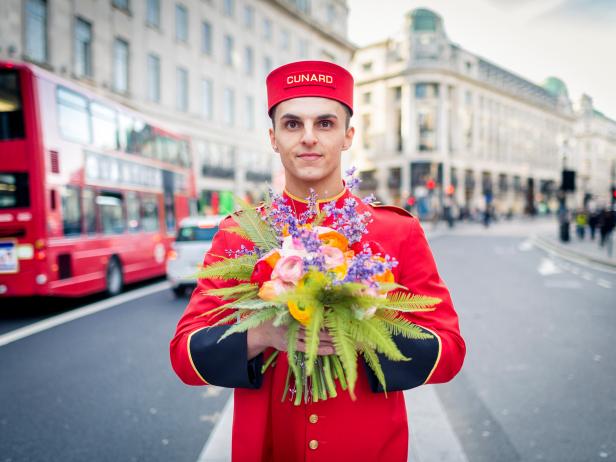 Cunard bellboy with flowers by florist Jenny Tobin in Regent Street, central London.
Picture date: Thursday March 2, 2017.
Photograph by Christopher Ison ©
07544044177
chris@christopherison.com
www.christopherison.com