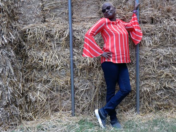 Angelique Kidjo, an international advocate for organizations such as UNICEF and Oxfam, poses for a photo on the farm before she performs at That Tent at Bonnaroo. U2 honored Kidjo and other powerhouse female icons during its set with a performance of the song "Ultraviolet."
