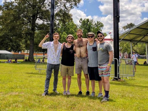 Reunited school buds Robert Guerrero, Sam Lebewitz, Adam Rudolph, Michael Thal, and Sam Arieven celebrate day one of Bonnaroo near the This Tent stage.