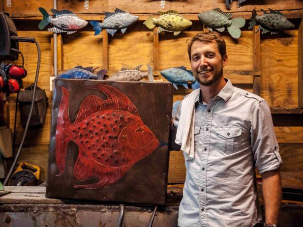 Artist Chase Allen displays some of his marine life sculptors from the Iron Fish Art Gallery on Daufuskie Island, South Carolina.