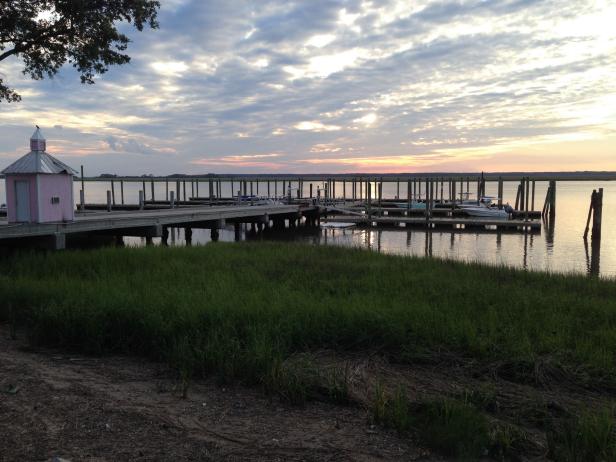 A sunset view of the Freeport Marina on Daufuskie Island, South Carolina which is also the site of the waterside restaurant, The Old Daufuskie Crab Company.