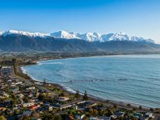 The Seaward Kaikoura Range and the town of Kaikoura on a clear spring morning. The town is an important tourist destination, particularly for obseving whales, dolphins and seals.