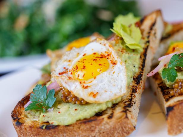 Close Up of Avocado Toast With Egg on Top