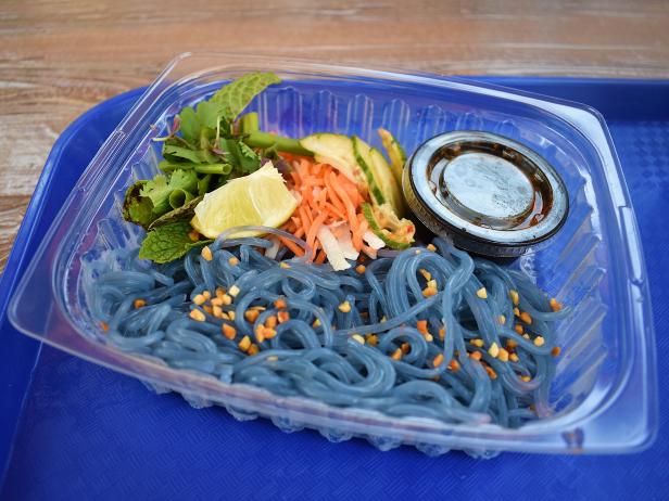 Plate With Blue Rice Noodles and Salad Toppings