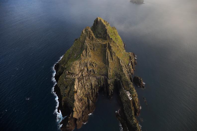 Location of Star Wars: The Last Jedi (also known as Star Wars: Episode VIII – The Last Jedi)  written and directed by Rian Johnson. It is the second film in the Star Wars sequel trilogy.The monastic Island of Skellig Michael was founded in 588 by Saint Fionán, for 600 years the island was a centre of monastic life for Irish Christian monks. located 12 kilometres off the coast County Kerry’s Inveragh Peninsula. Skellig Michael is the most spectacular of all the early medieval island monastic sites. The monastery consisting of six beehive huts, is situated almost at the summit of the 230-metre-high rock. It became a UNESCO World Heritage Site in 1996 and is one of Europe's better known but least accessible monasteries. Skellig Michael is the most spectacular of all the early medieval island monastic sites. Skellig Michael (Sceilig Mhicíl in Irish) and Great Skellig. The word Scellic means a steep rock.Photo:Valerie O’Sullivan/FREE PIC/REPRO FREE;