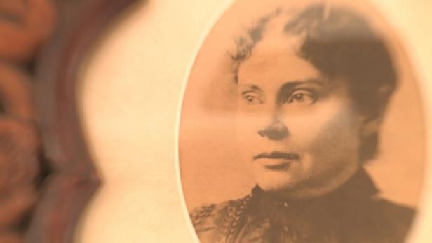 A portrait of Lizzie Borden.