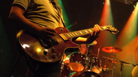  'A Rock guitar player close up'